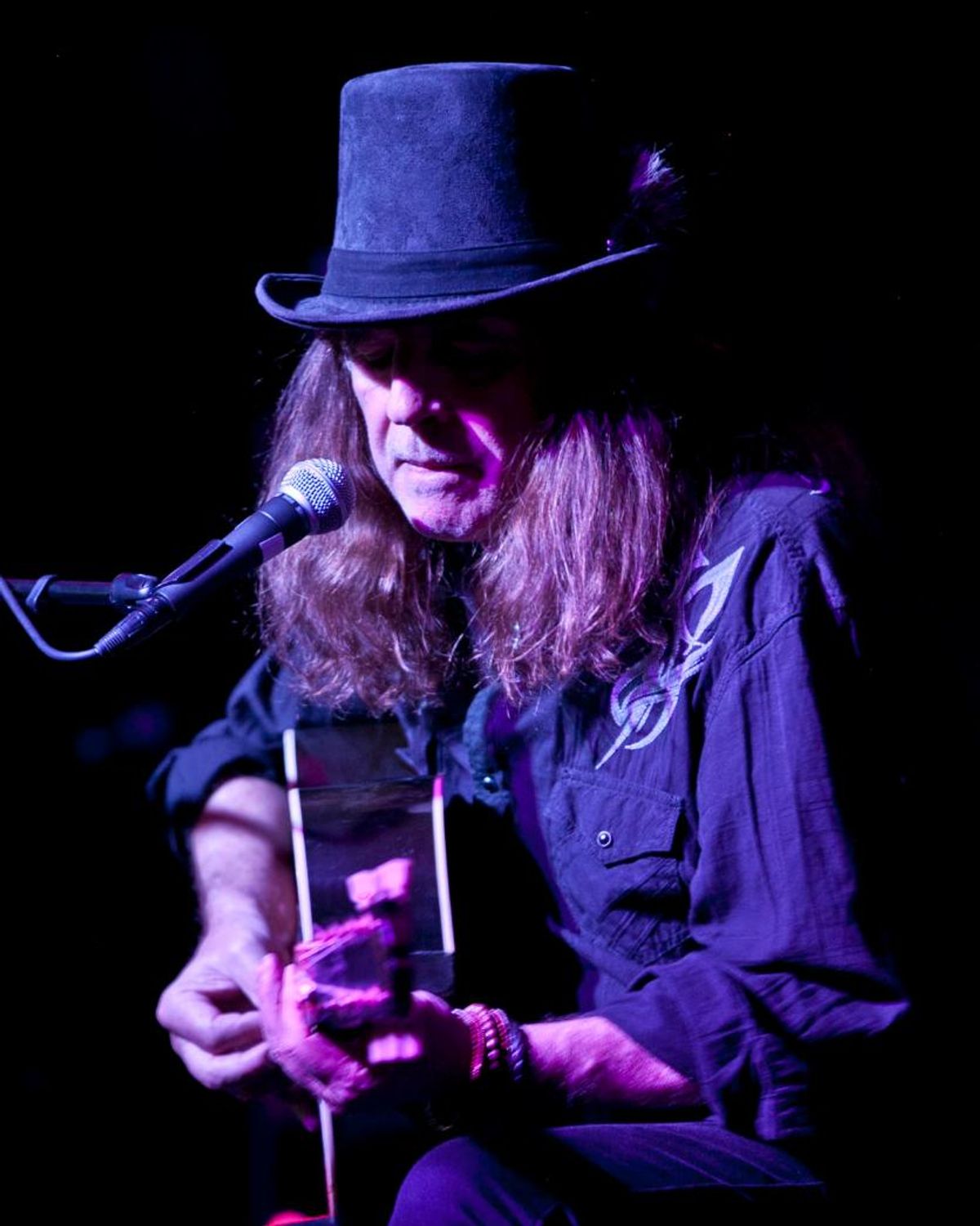 Image of the Southbound stage with a mircophone in the foreground.